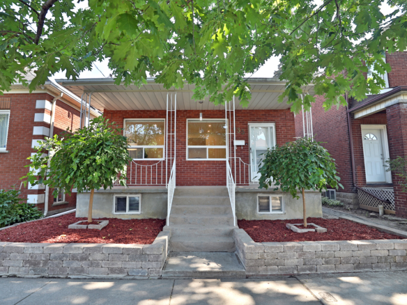 SOLD $250,000 OVER ASKING: 4 Bedroom + In-Law Suite Bungalow North of Junction